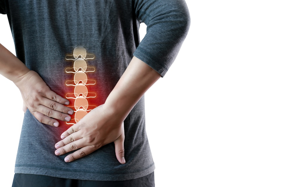 Young,Man,Feeling,Suffering,Lower,Back,Pain,Pain,Relief,Concept